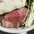暖かいご飯の上に、とろっととろけました
