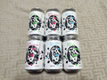 3種6本の赤青緑のロゴプリントされた缶