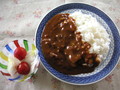 つややかなカレールー。大根とミニトマトのポン酢サラダを添えて